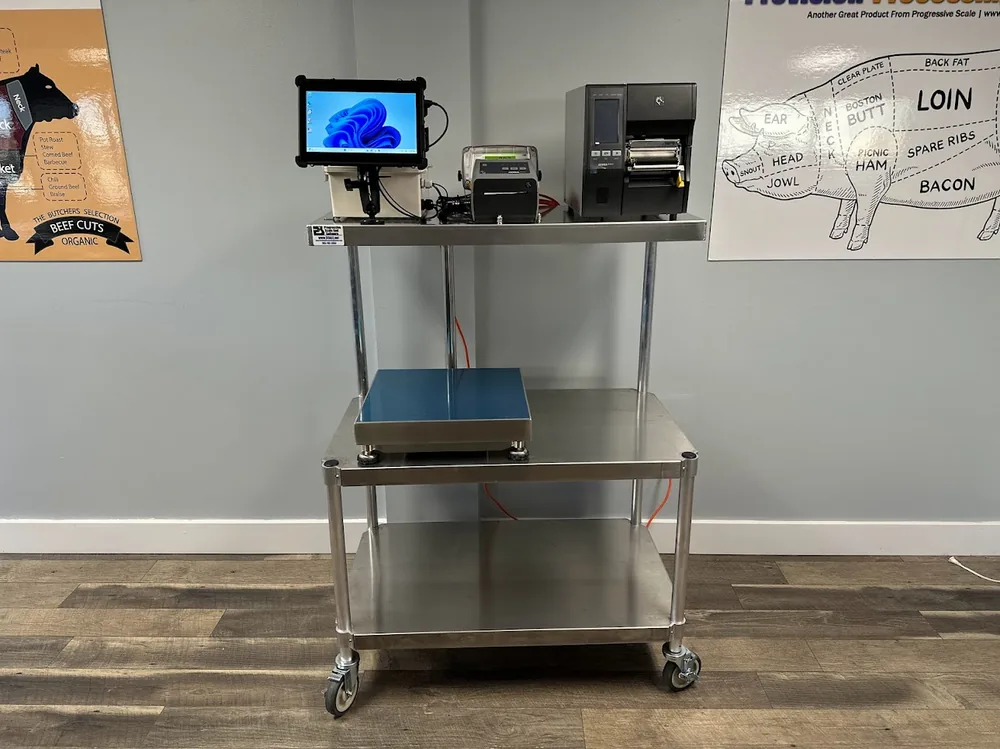 A mobile stainless scale cart carrying a rugged tablet, Zebra industrial label printer, desktop printer, and bench scale platform.